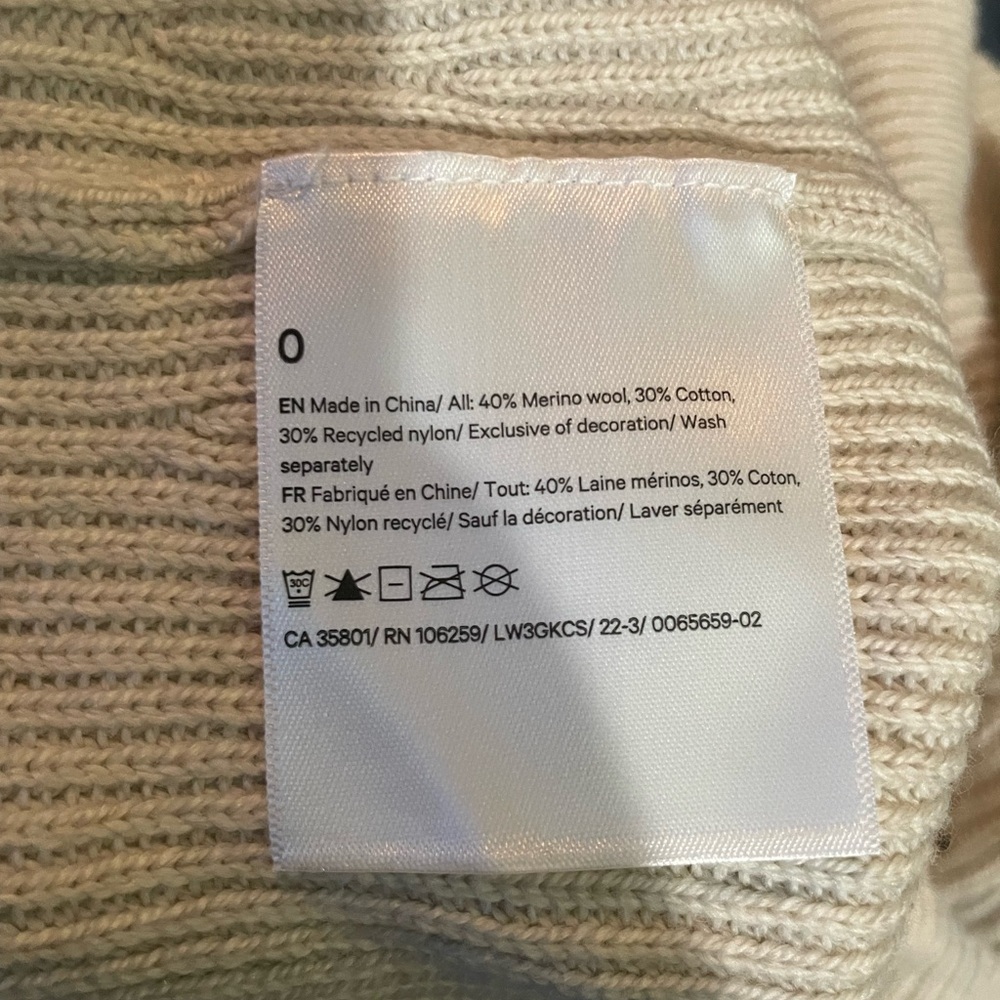 Lululemon Merino Wool-Blend Ribbed Turtleneck Sweater in Heathered Natural Ivory - Picture 7 of 7